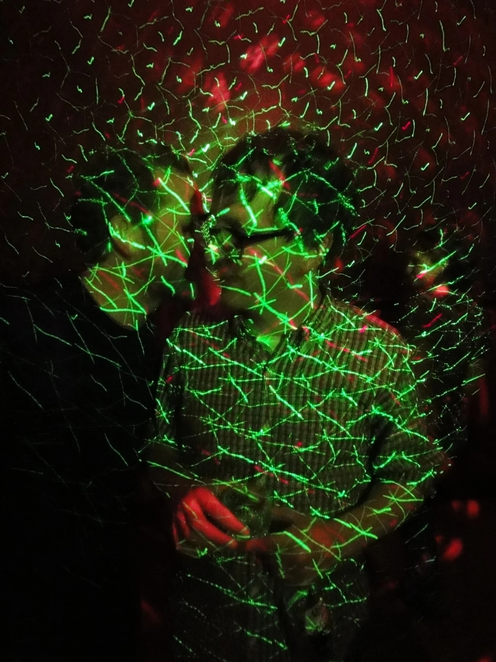 a  with green lights in his hands