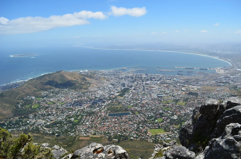 an aerial view of a city, including water and land