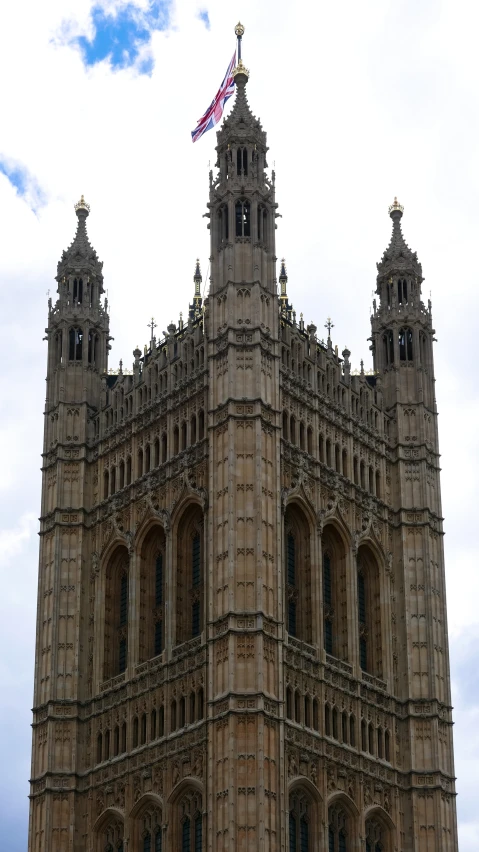 a large building has a very tall tower