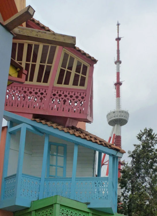 the top of a building with some buildings next to it