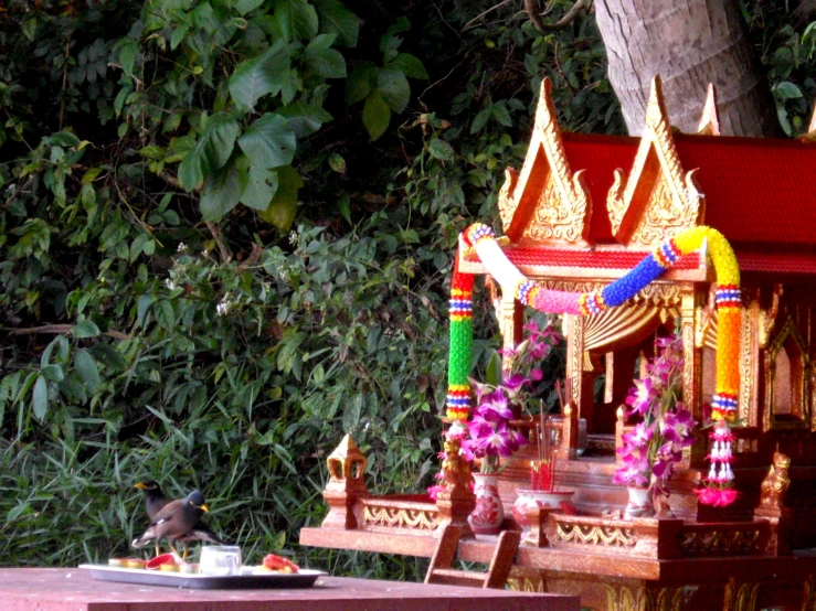 a small shrine made out of wooden blocks