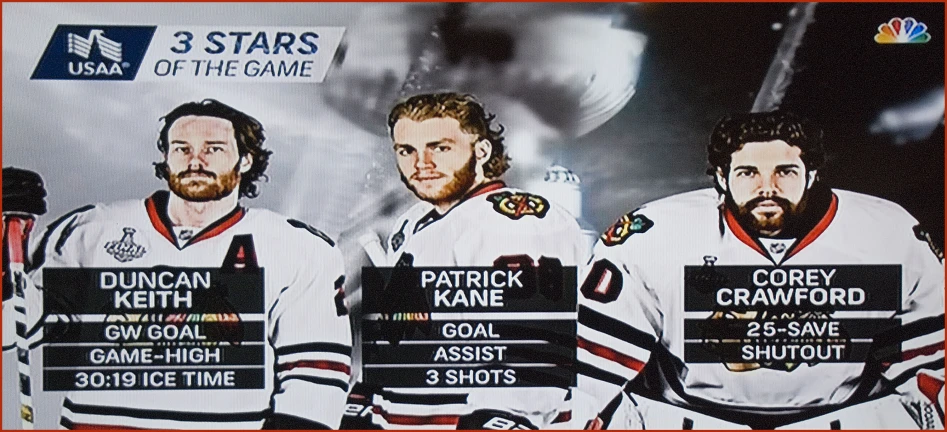 three men posing for a picture with their hockey rosters