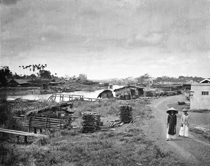 a vintage black and white pograph of a boat yard