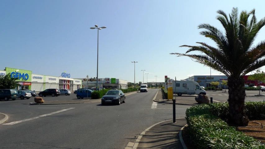 a view of the street that runs next to the store