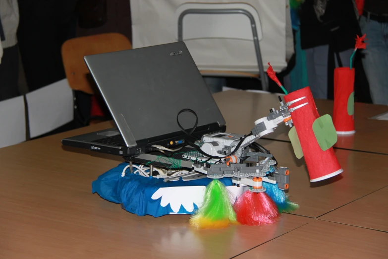 a laptop sitting on top of a table