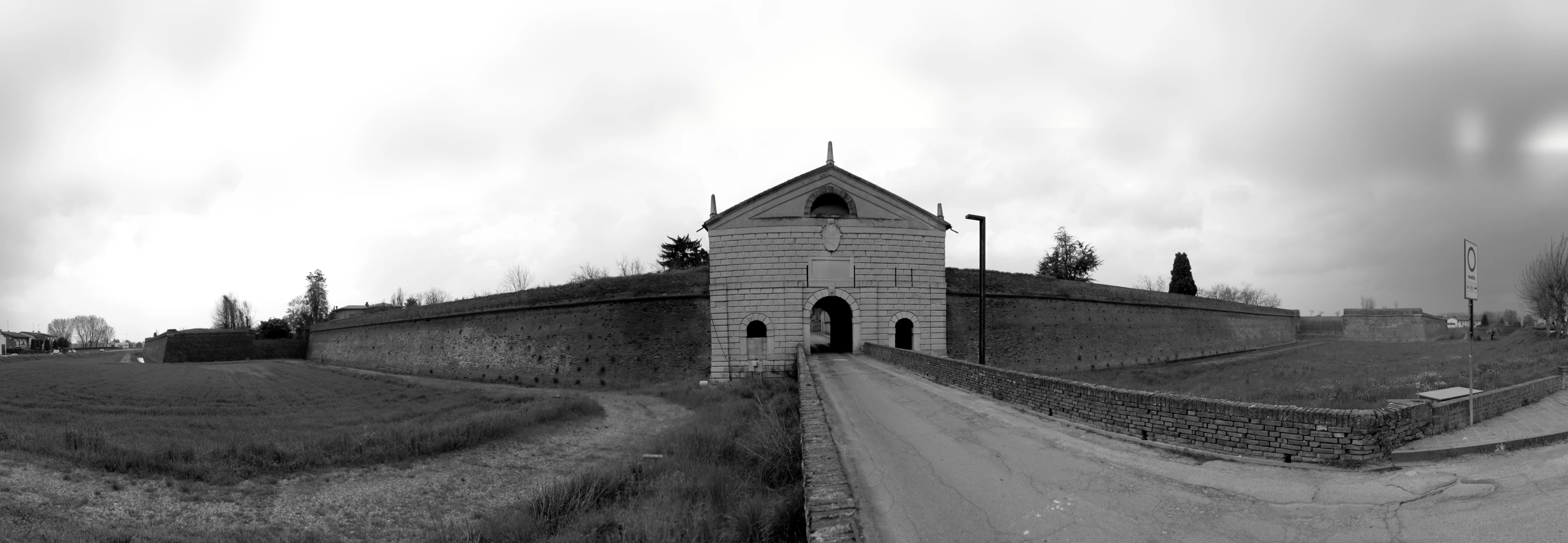 there is an old building in the middle of a field