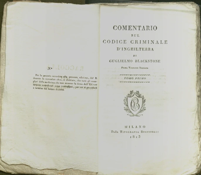 an open book with italian writing on it