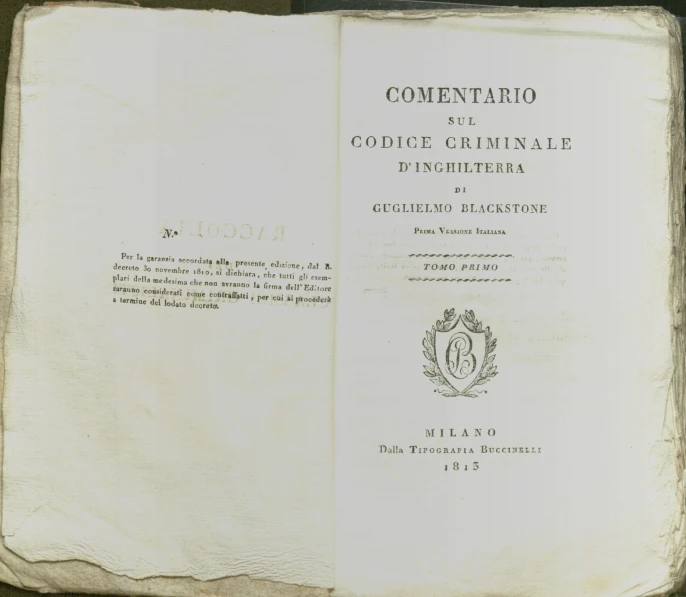 an open book with italian writing on it