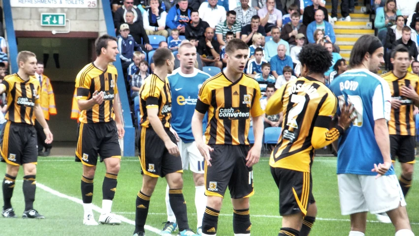 there are many soccer players lined up in formation