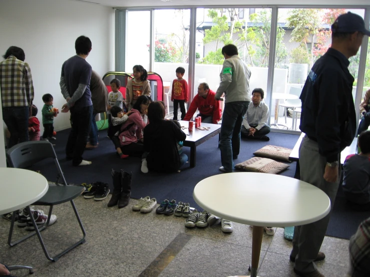 an image of a group of people working in a room