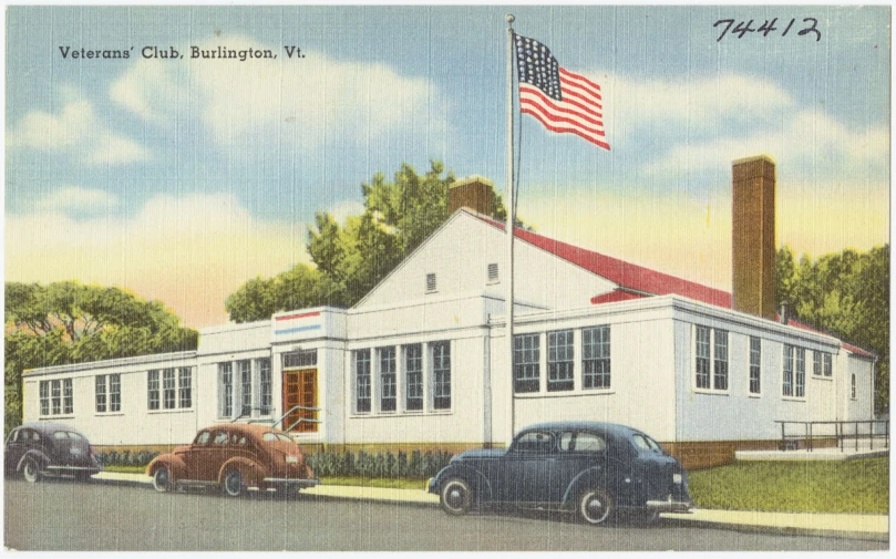 an old po shows two vehicles outside a white church