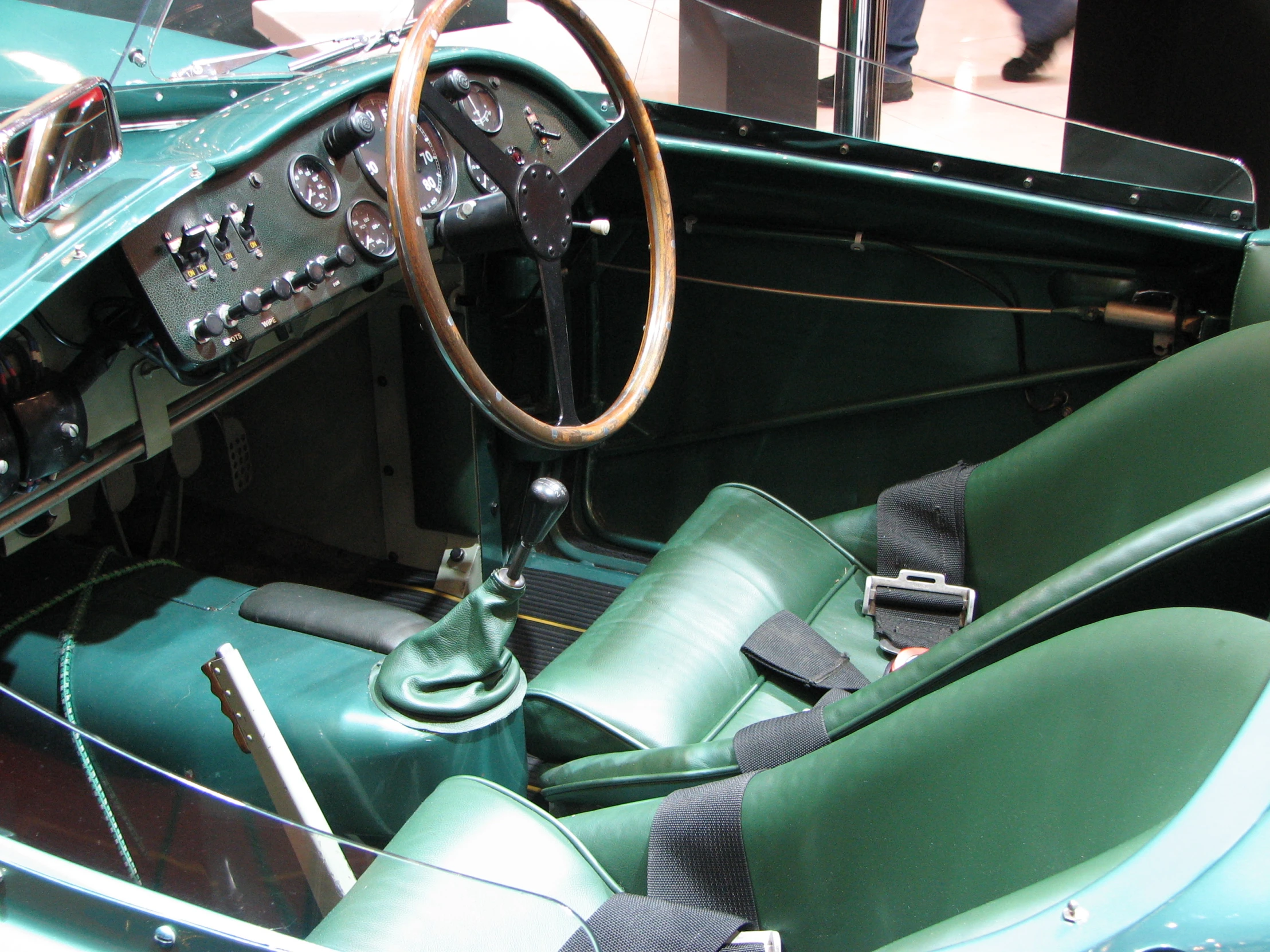 the cockpit and steering wheel of a sports car