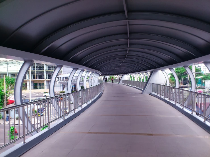 the walkway is a walkway that extends into a building