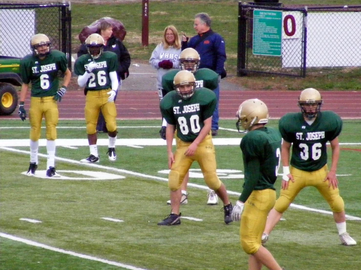 a group of young men playing a game of football