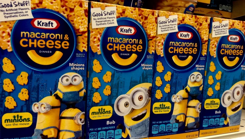 three packs of cereal that have minions on them