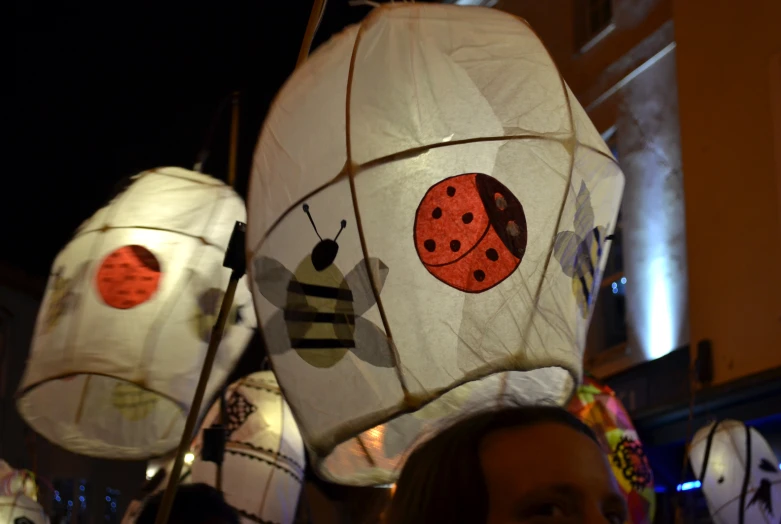 an image of lamps with lady bugs on them