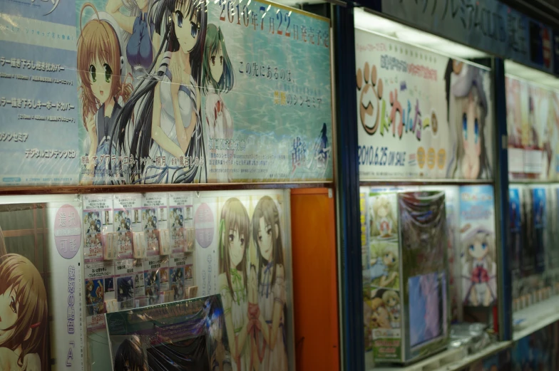 a wall covered in lots of anime posters