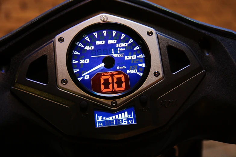 a close - up view of the gauges on a motorcycle