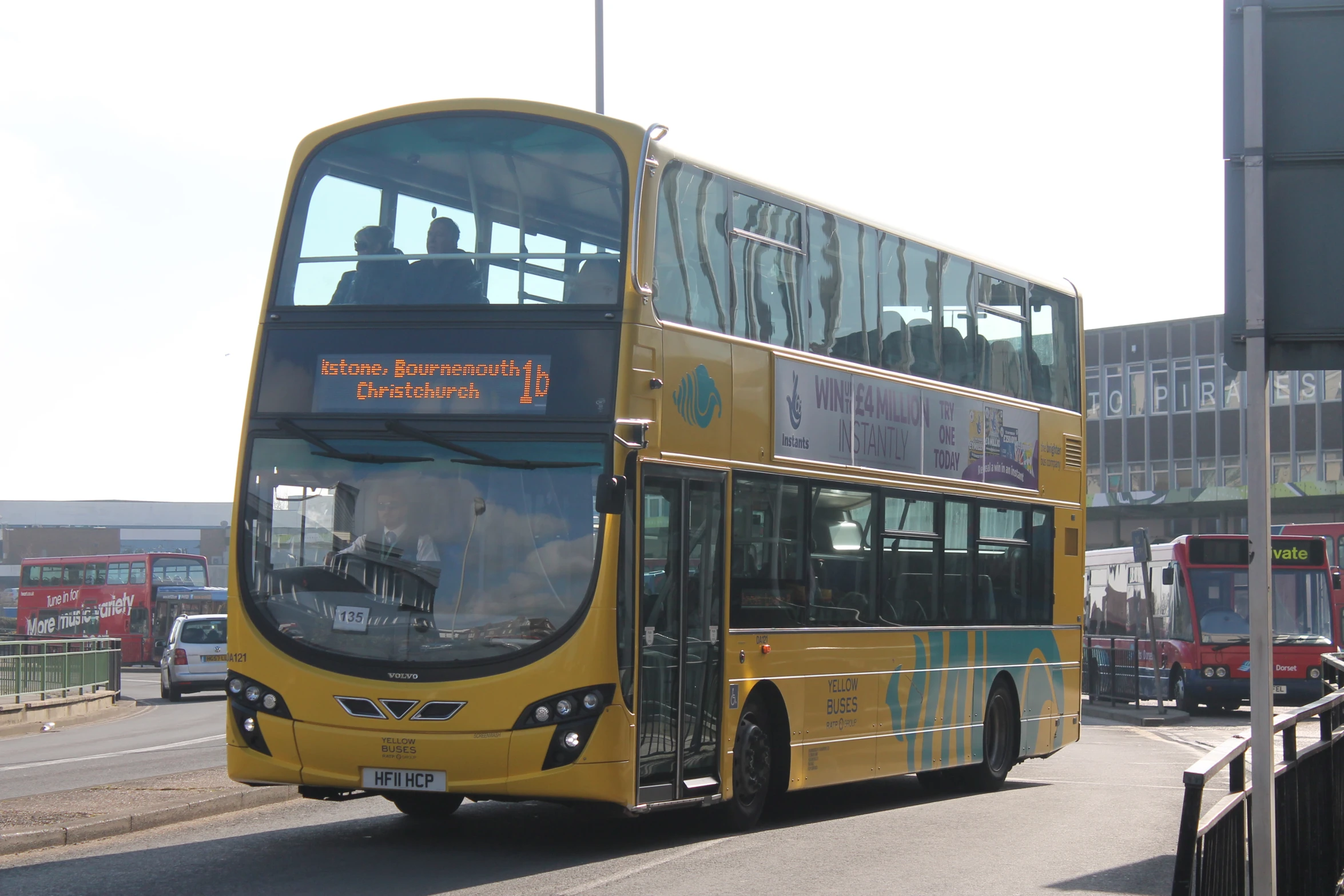 a double decker bus in motion on the road