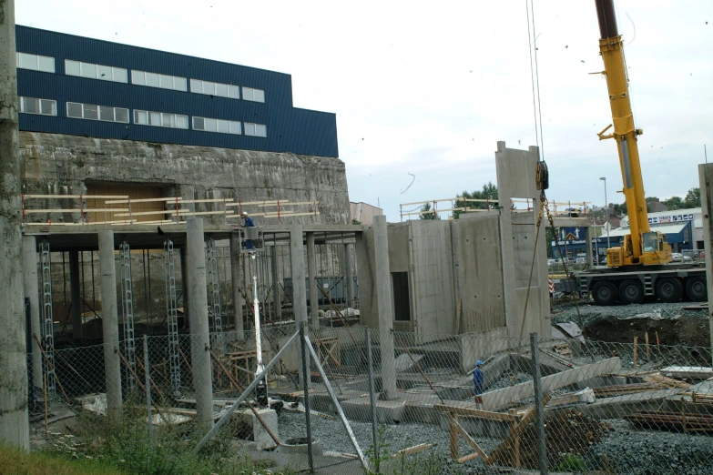 a crane and some buildings that are being constructed