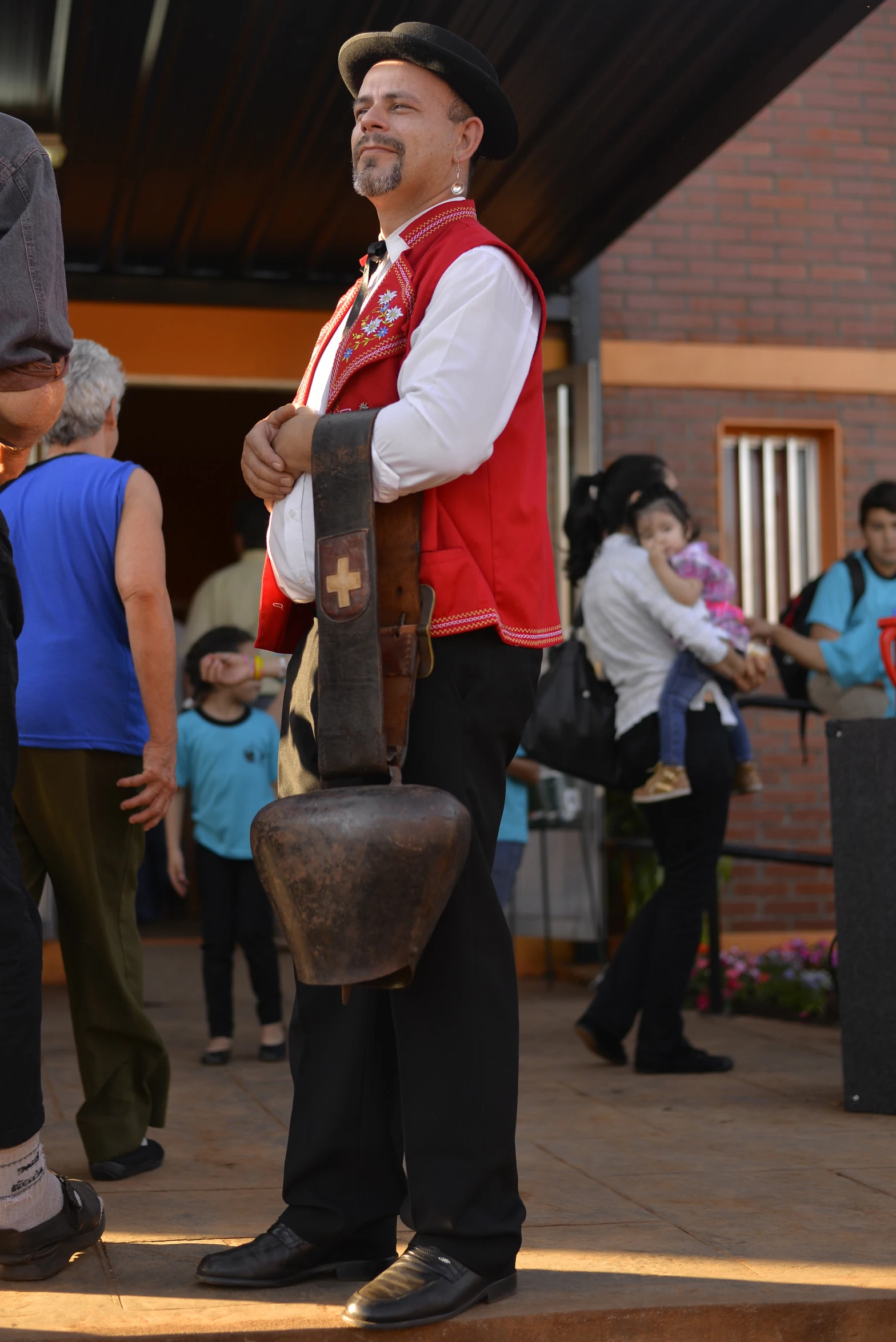 a man is playing with his mallet outside