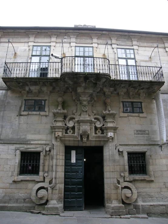 a very old stone building with an entrance