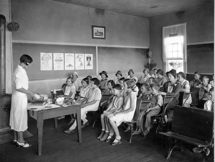 old black and white pograph of women in uniforms