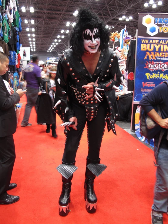 a male wrestler on display at a convention