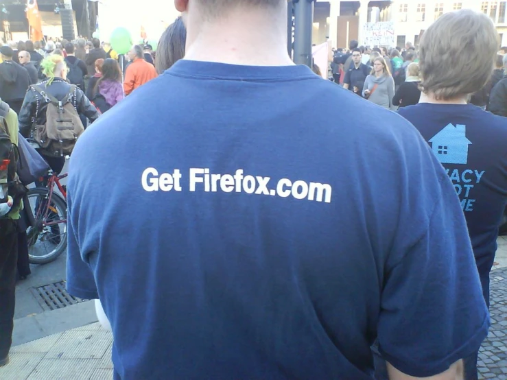 the back of the man has a t - shirt that says get firebox com