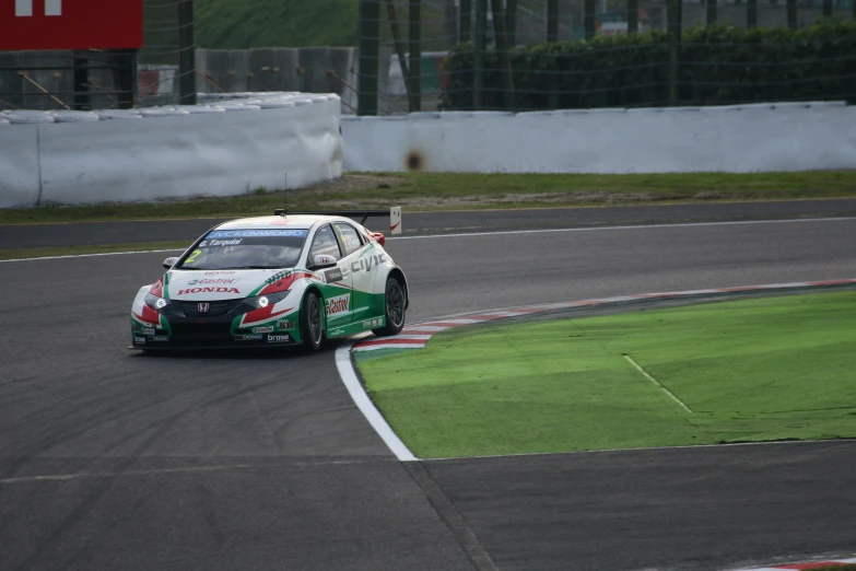 a car that is driving around a race track