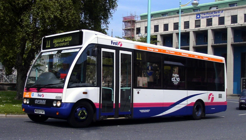 a bus that is driving down the street