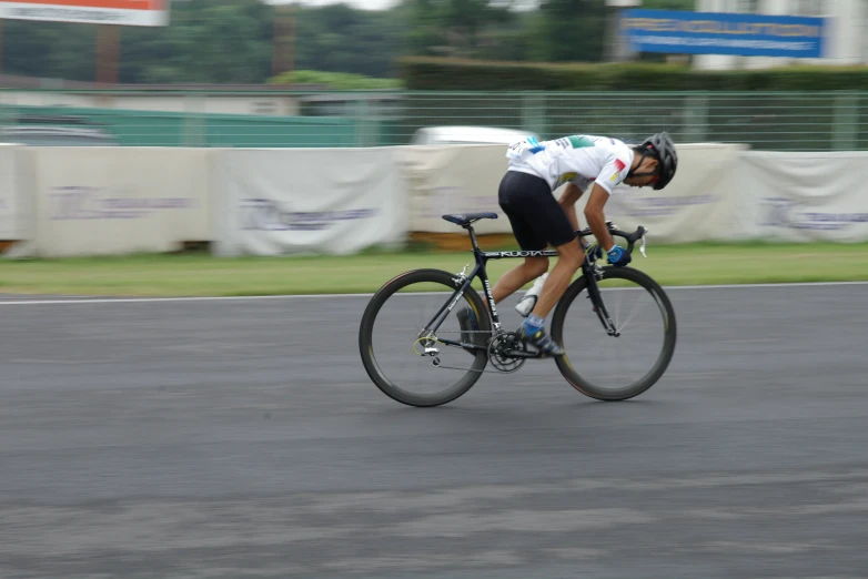 a person riding on a bike in a race