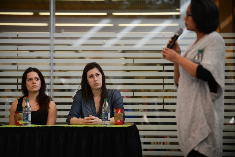 a group of women sitting at a table