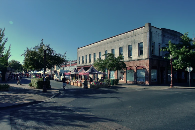 a street scene with shops along side a street