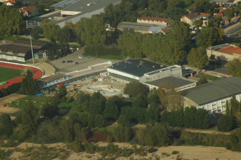 an aerial view of a football stadium building