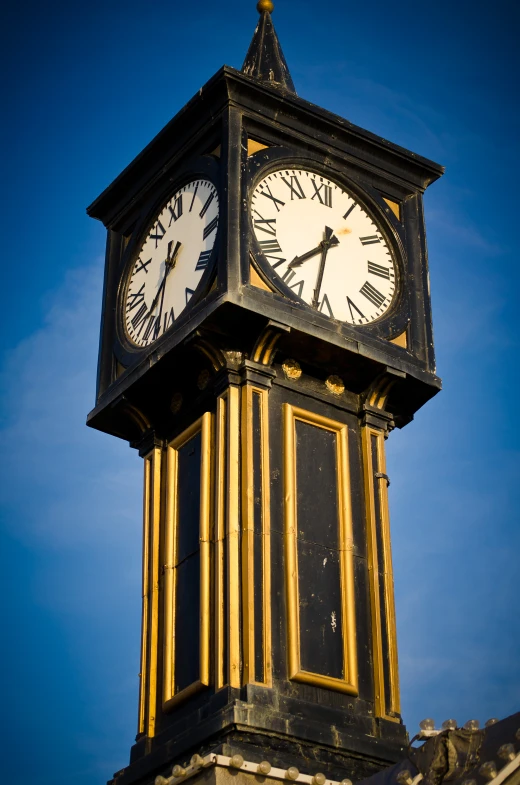 there is a tall tower that has two clocks on it