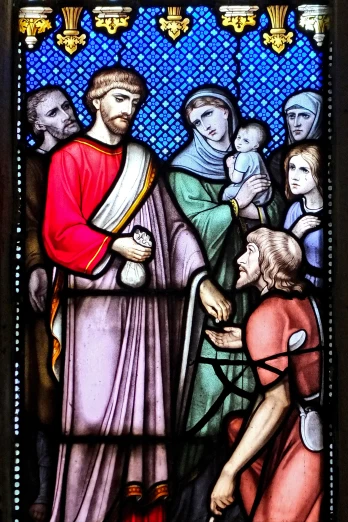 an stained glass depicting jesus and two other people