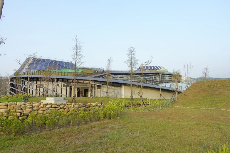 a house in progress and surrounded by lots of grass