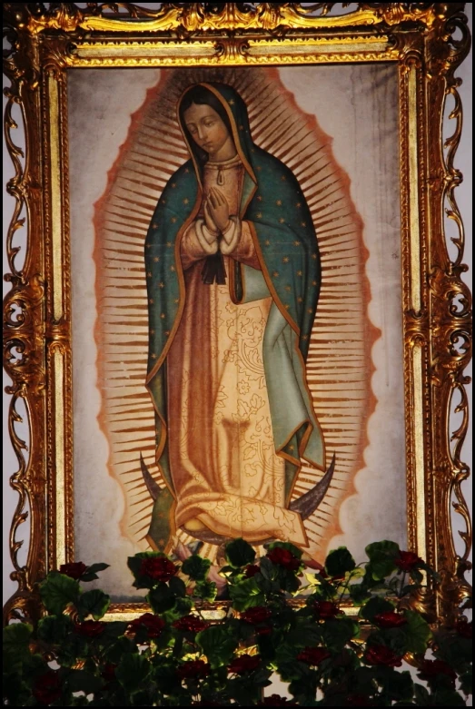 large framed religious painting featuring the virgin mary