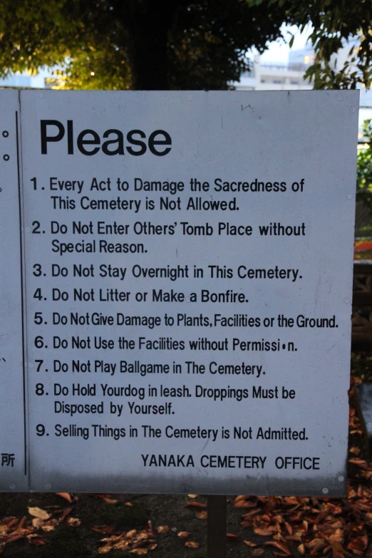 a sign on the ground describing the rules for public