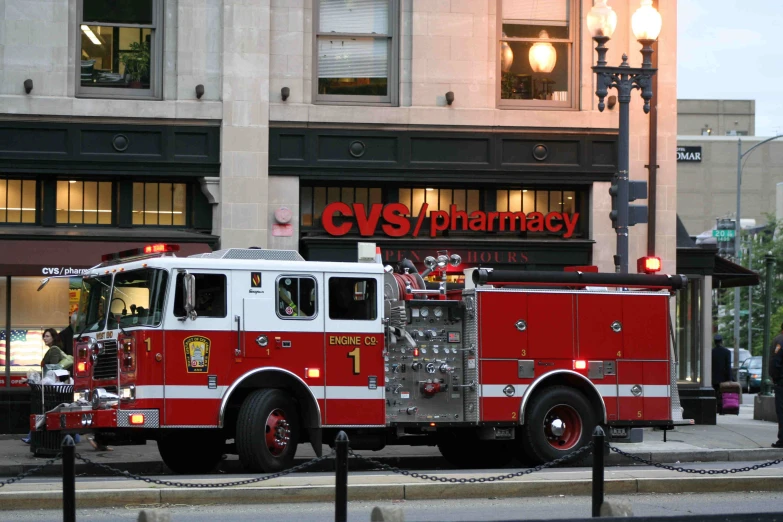 a fire truck parked on the side of the street