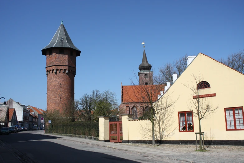 two old brick structures with towers near each other