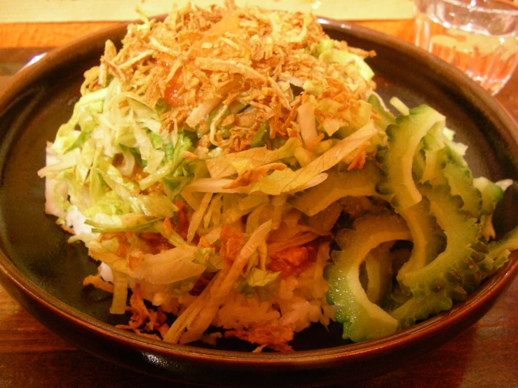 a very tasty looking salad served with cucumber