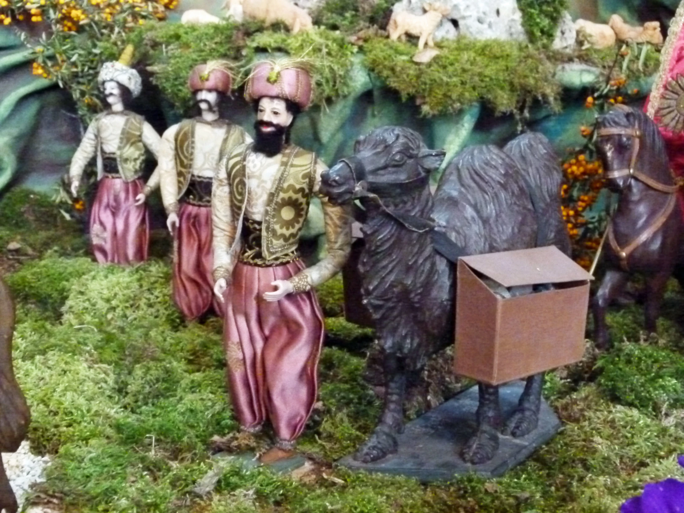 a group of figurines that are dressed in costumes