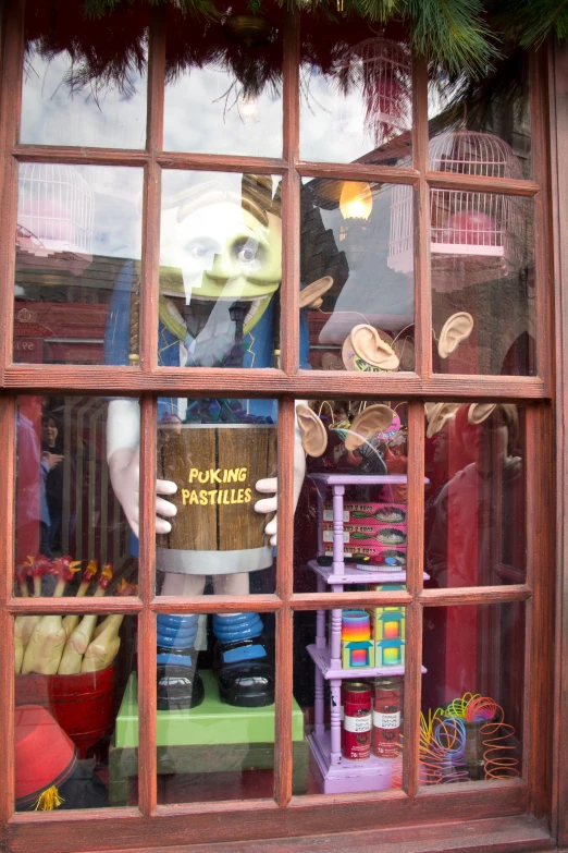 an assortment of items displayed in front of a window