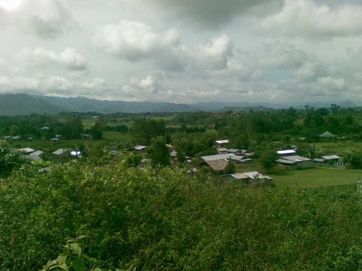 an aerial view of a village and the surrounding area