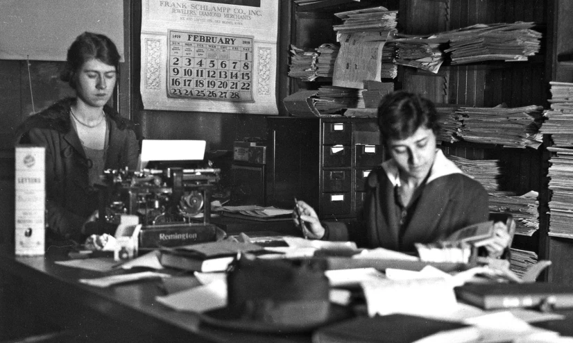 a vintage po of two women at the desk