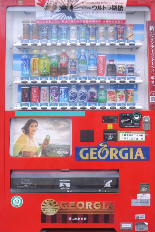 a big red vending machine with drinks