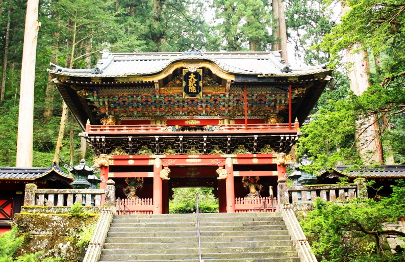 steps leading up to a large pagoda