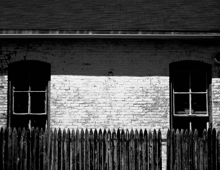 the windows are open on this brick building